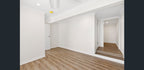 Detail view of Beige Sand SPC 6.5mm SPC hybrid flooring sample