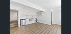 Detail view of Beige Sand SPC 6.5mm SPC hybrid flooring sample