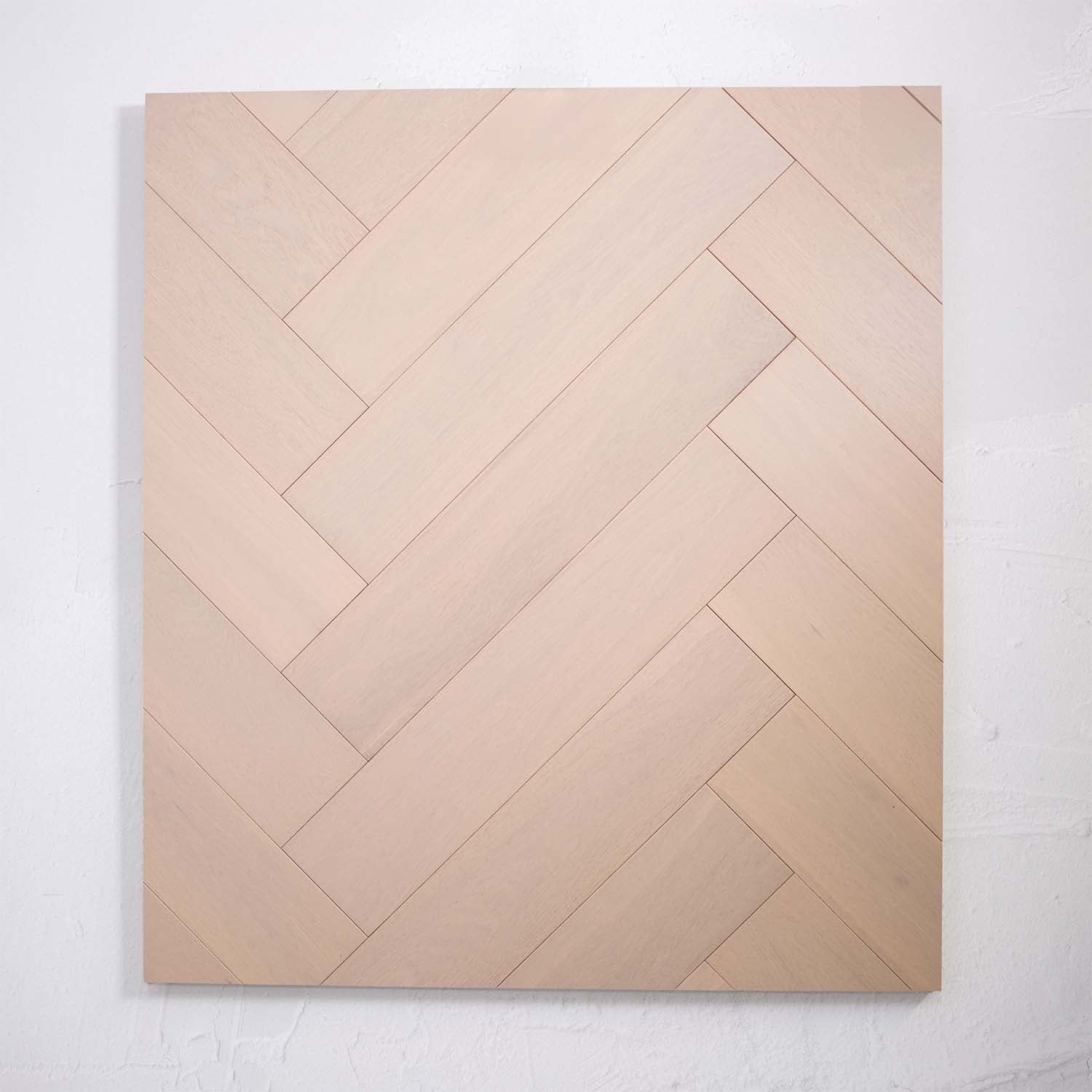 Side view of Casper White Engineered Timber Herringbone 15.3mm in Casper White colour light tone herringbone flooring sample