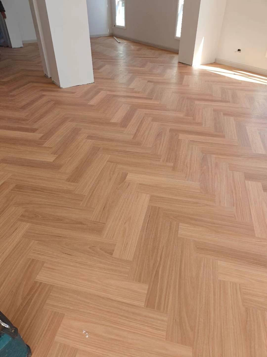 Natural Blackbutt SPC Herringbone 9.5mm