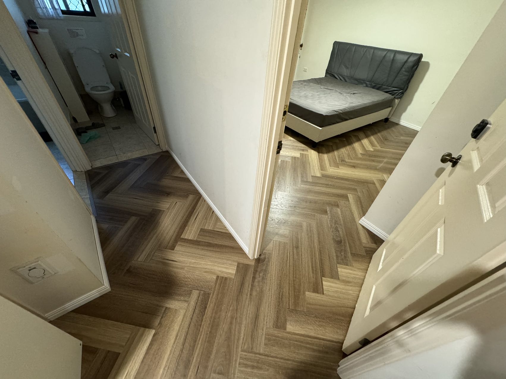 Natural Spotted Gum SPC Herringbone 9.5mm