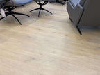 Detail view of Pale Sand SPC 6.5mm SPC hybrid flooring sample