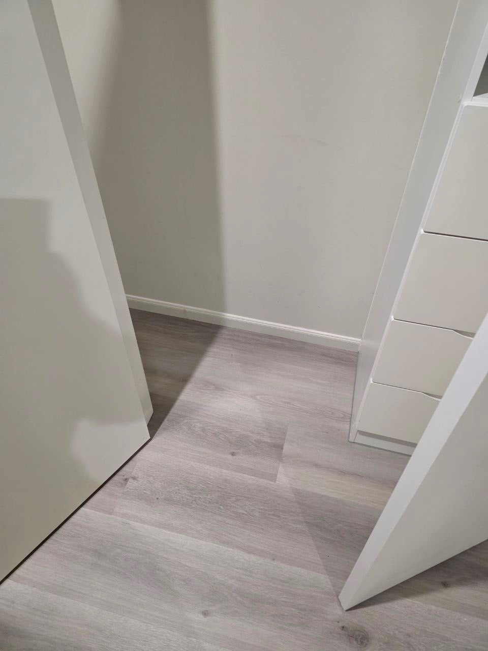 Installed room view of Snow Grey SPC 9.5mm SPC hybrid flooring sample