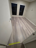 Installed room view of Snow Grey SPC 9.5mm SPC hybrid flooring sample