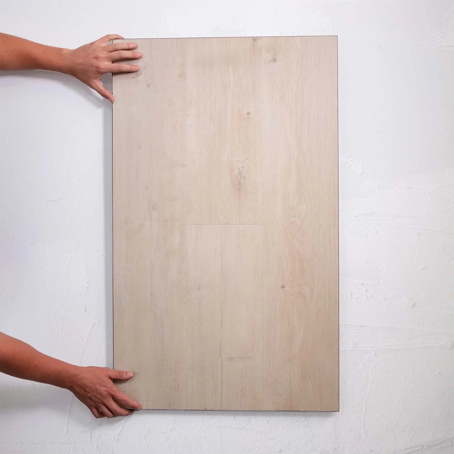 Perspective view of Ivory Beige SPC 6.5mm SPC hybrid flooring sample