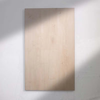 Close-up view of Ivory Beige SPC 6.5mm SPC hybrid flooring sample