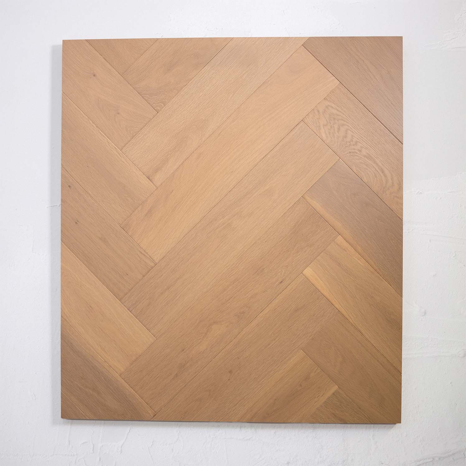 Side view of Light Malt Engineered Timber Herringbone 15.3mm in Light Malt colour light tone herringbone flooring sample