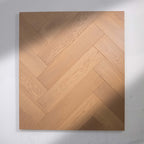 Close-up of Light Neutral Engineered Timber Herringbone 15.3mm in Light Neutral colour light tone herringbone flooring sample