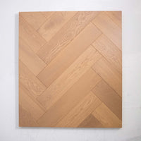 Detailed view of Light Neutral Engineered Timber Herringbone 15.3mm in Light Neutral colour light tone herringbone flooring sample