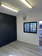 Detail view of Light Grey SPC 6.5mm SPC hybrid flooring sample