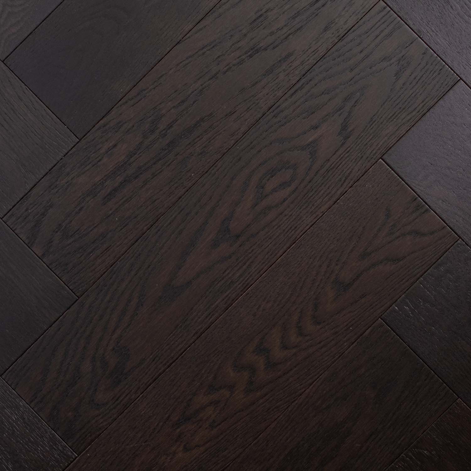 Top-down view of Midnight Grey Engineered Timber Herringbone 15.3mm in Midnight Grey colour dark shade herringbone flooring sample