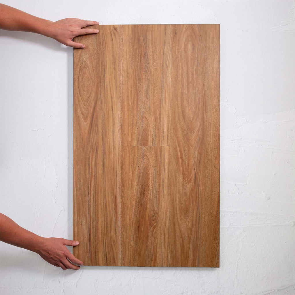 Front view of NSW Spotted Gum SPC Hybrid Floorboards 5+1.5mm in NSW Spotted colour warm tone hybrid flooring sample