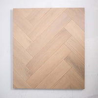 Angled view of Natural Limed Engineered Timber Herringbone 15.3mm in Natural Limed colour warm tone herringbone flooring sample