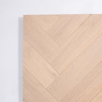 Flat lay of Natural Limed Engineered Timber Herringbone 15.3mm in Natural Limed colour warm tone herringbone flooring sample