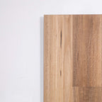 Side view of QLD Spotted Gum Hybrid Flooring 6.5mm in QLD Spotted colour warm tone hybrid flooring sample