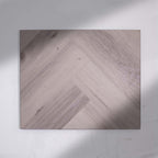 Full view of Snow Grey SPC Hybrid Floorboards Herringbone 7.5+2mm in Snow Grey colour light tone herringbone flooring sample