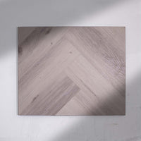 Full view of Snow Grey SPC Hybrid Floorboards Herringbone 7.5+2mm in Snow Grey colour light tone herringbone flooring sample